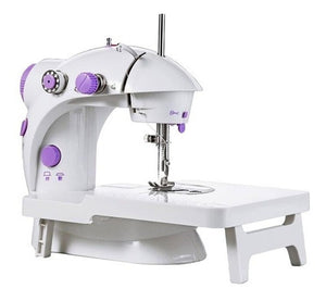Máquina de coser con mesa