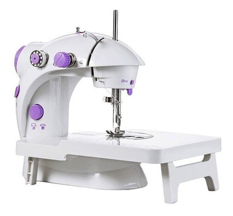 Image of Máquina de coser con mesa